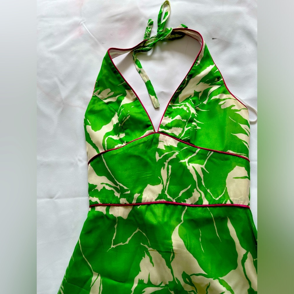 Green and white floral print halter dress mid length